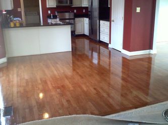 Hardwood Floors and a White Counter Top