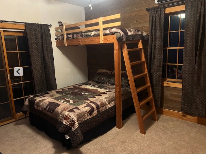 A Bunk Bed With Ladder