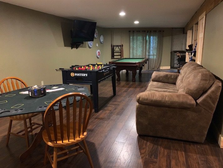 A Game Room With a Pool Table