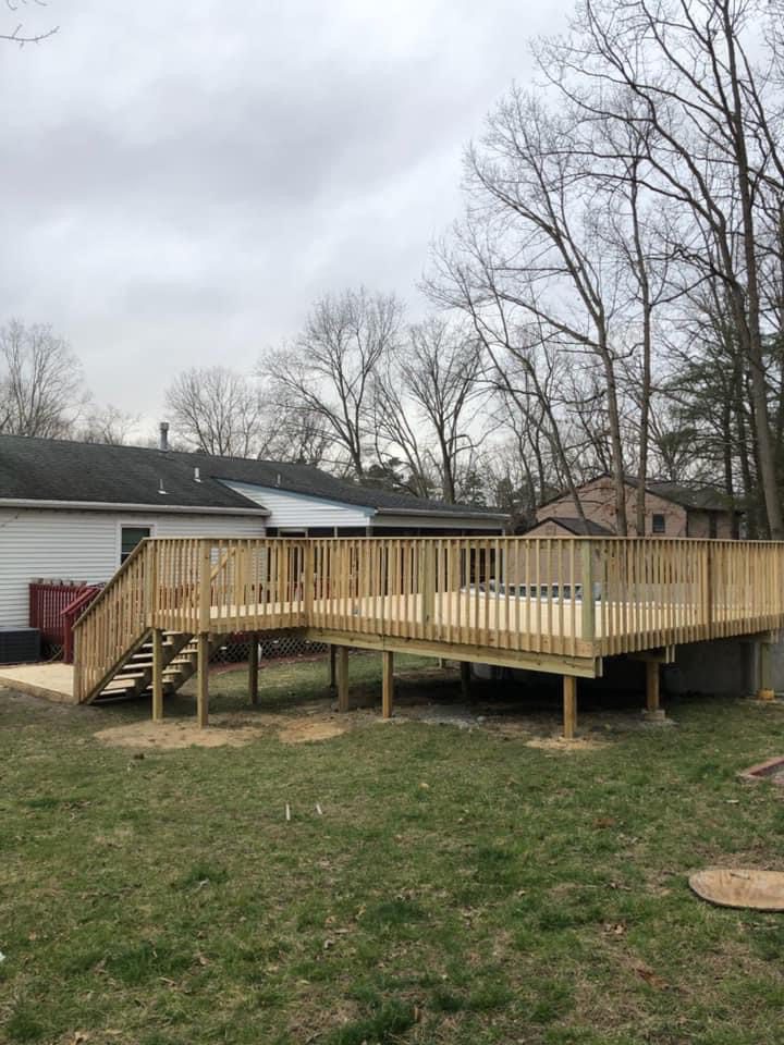 Wooden Deck With Railing and Stairs