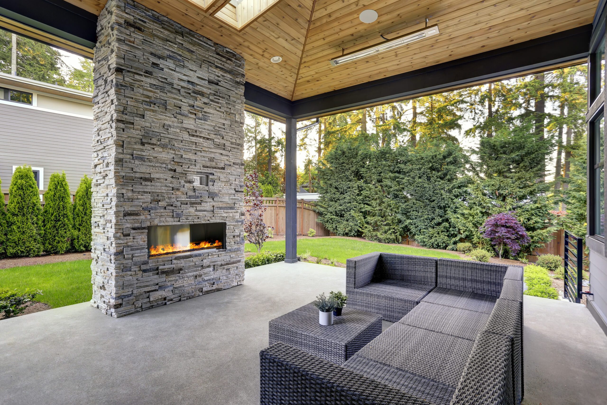 New Modern Home Features a Backyard With Covered Patio